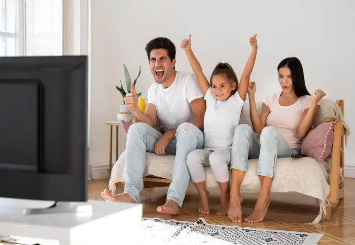 family-spending-time-front-tv